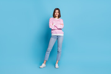 Wall Mural - full size photo of nice young brunette lady crossed palms stand wear pullover jeans sneakers isolate