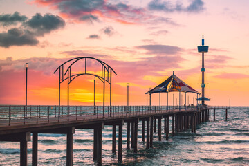 Wall Mural - Brighton jetty at dramatic sunset viewed from Esplanade, South Australia