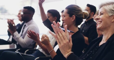 that talk deserve a round of applause. group of businesspeople clapping hands while sitting in a con