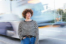 Woman Near Bus In Motion