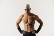 © Drobot Dean - Young shirtless sportsman with tattoo posing on camera