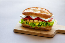 Delicious Sandwich With Chicken On Cutting Board
