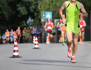 Wall Mural - athletic marathon during the foot race in the city with sportswear