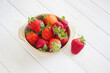 Bowl of Fresh strawberries on white
