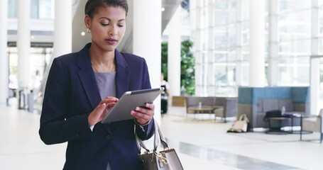 Poster - Keep sending that good feedback online. Businesswoman using a digital tablet in the workplace. Cheerful businesswoman walking and using a tablet. Businesswoman using a digital tablet, giving thumbs up