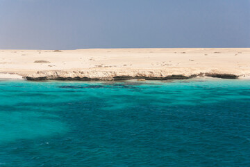 Wall Mural - Egypt. Woman in Mahmya beach