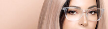 Closeup Eyes In Eyeglasses. Gorgeous Model Girl In Fashionable Clear Glasses Looking At Camera. Fashion Eyewear And Clear Vision Concept