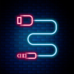 Poster - Glowing neon line Audio jack icon isolated on brick wall background. Audio cable for connection sound equipment. Plug wire. Musical instrument. Colorful outline concept. Vector