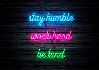 Wall Mural - Blue, pink and green neon sign motivational quote with brick wall background; Stay humble, work hard, be kind.