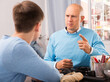 © JackF - Strict father having serious conversation with teen boy at home