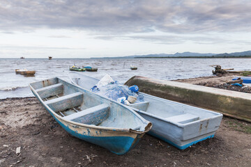 Naklejka na meble Small boats lay on the coast of Samana Bay