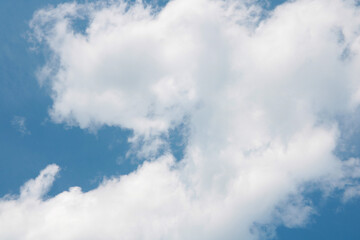 Wall Mural - View of the blue sky with white clouds. The background of nature.