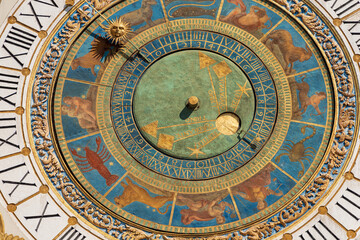 Brescia downtown. Clock and bell tower in Renaissance style, 1540-1550, in Loggia town square (Piazza della Loggia). Lombardy, Italy, Europe. Astronomical clock with the constellations of the zodiac.