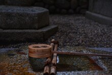 Ladles For Water Purification At The Entrance Of A Shinto Shrine In Japan