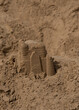 Broken child's sand castle on Hunstanton beach, Norfolk.