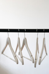 Wall Mural - many clothes hangers on the rack, abstract creative fashion concept