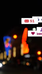 Wall Mural - animation of social media icons and numbers over road traffic and cityscape lights