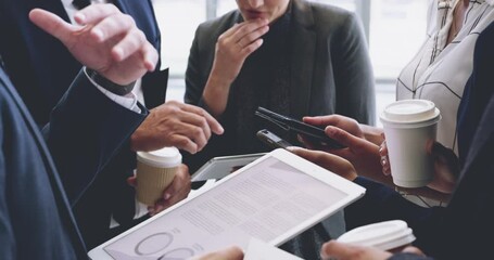 Poster - Planning and preparing for whats ahead. 4k footage of a group of businesspeople holding wireless devices while having a discussion in an office.