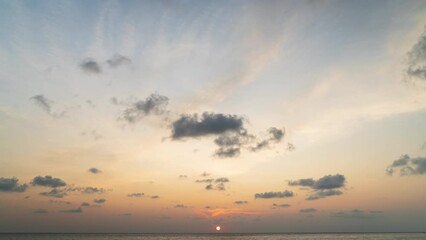 Wall Mural - time lapse video amazing scene of colorful sunset with moving clouds background in nature and travel