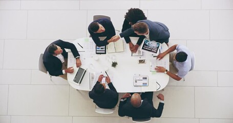 Aufkleber - Glad to see everyone could join us. High angle 4k video footage of a group of businesspeople having a meeting together around a table at work during the day.