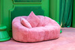 The pretty pink sofa in the room