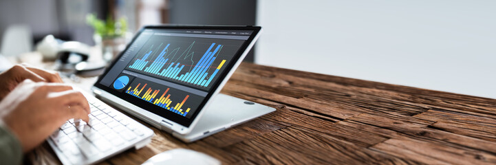 Poster - Businessperson Pointing At Graph On Digital Laptop