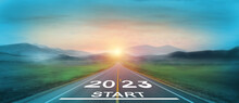 New Start Of The New Year 2023.  Starting To New Year.  2023 Written On The Road In The Middle Of Asphalt Road At Sunset. Goals,plan,opportunity And New Business Or Life Changing For The Next Year.