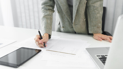 Confidence woman concept, Businesswoman is checking information to analyzing business strategy