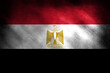 The flag of Egypt on a retro looking background