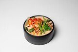 Fototapeta Kuchnia - Ramen, noodle and egg soup, Asian food, Ramen in a black round plate, Ramen with chicken and mussels