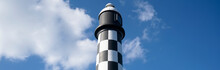 Lighthouse With Black And White Chequer Design