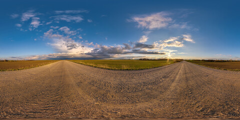 Wall Mural - full seamless spherical hdri 360 panorama view on no traffic gravel road among fields in summer even