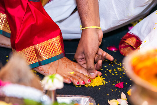 tamil hindu wedding ceremony rituals, bride's feet and rings close up
