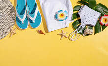 Summer Accessories With Clothes, Shoes, Tropical Leaves And Flowers, Flat Lay