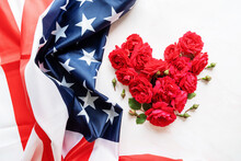 Heart Shape Of Red Roses With The USA Flag Top View Flat Lay