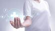 © Kanrawee8 - Woman holding  network connection medical symbol and icons  innovation technology medical on interface with medical network connection, medicine technology network concept, life insurance business.