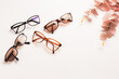 © Brebca - Several trendy stylish glasses on white background with copy space