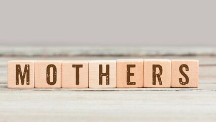 Wall Mural - Word Mothers on wood cubes