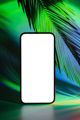 Wall Mural - mockup smartphone with tropical palm leaf on abstract background in neon gradient. mobile phone ith 