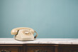 © DMegias - Close-up view of an old telephone on a table.