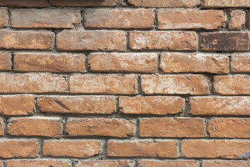 Wall Mural - Old brick wall.Texture background of a wall made of old red brick.