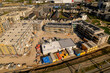 Bright aerial view of construction site in Zutphen of real estate investment and social housing market collective building project. Dutch engineering real estate investment urban development