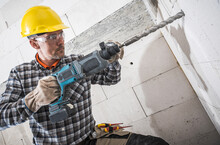 Construction Worker With Powerful Hammer Drill