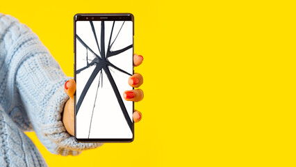 Poster - A woman demonstrates a smartphone with a broken screen. Cracks on the mobile phone screen. Orange background with space for text. Electronics repair.
