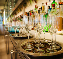 Champagne glasses ready to be filled at an event