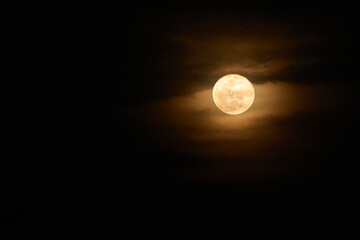 Wall Mural - view of the full moon with few clouds
