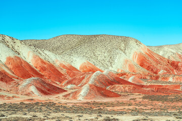 Wall Mural - Red sand mountains in the desert area