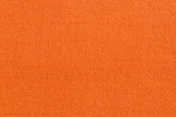 Wall Mural - Orange cotton fabric texture background, seamless pattern of natural textile.