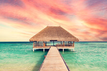 Beach In Maldives At Sunset, Wooden Jetty