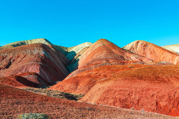 Wall Mural - Red sand mountains in the desert area